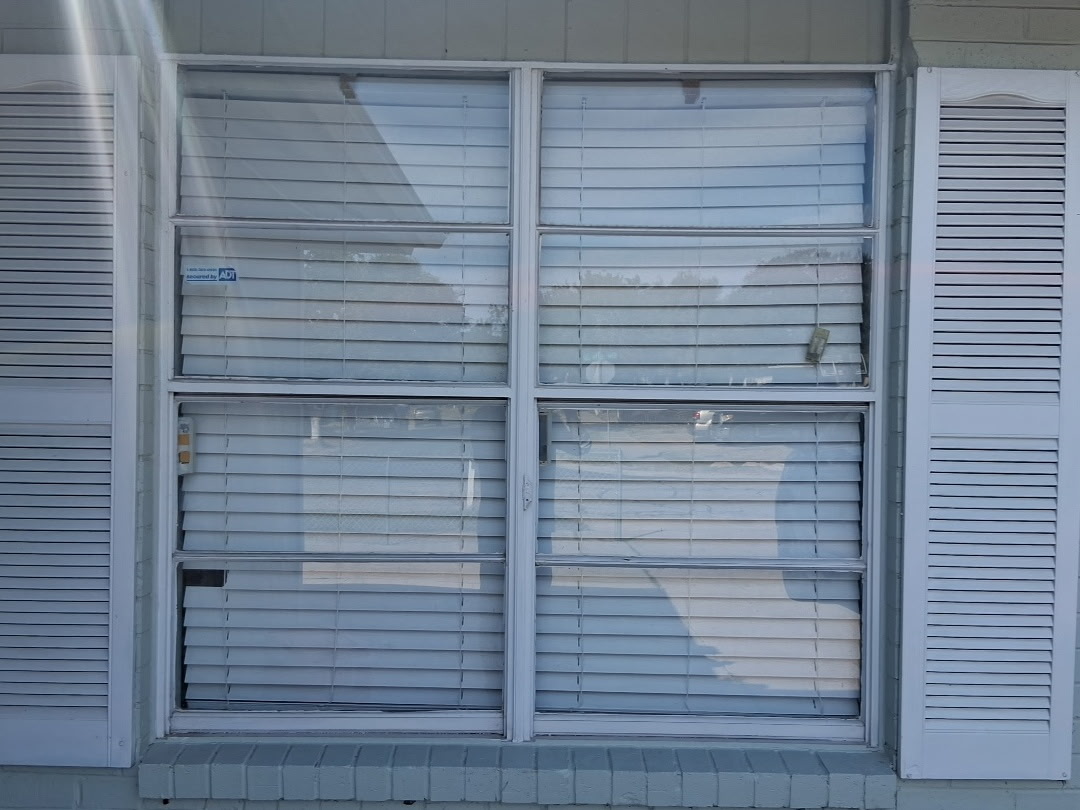 Energy-Efficient Window Replacement — before roof replacement